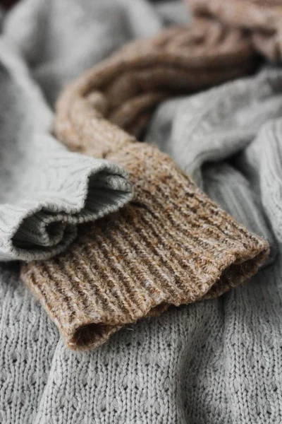 Beautiful knitted grey and brown sweaters macro