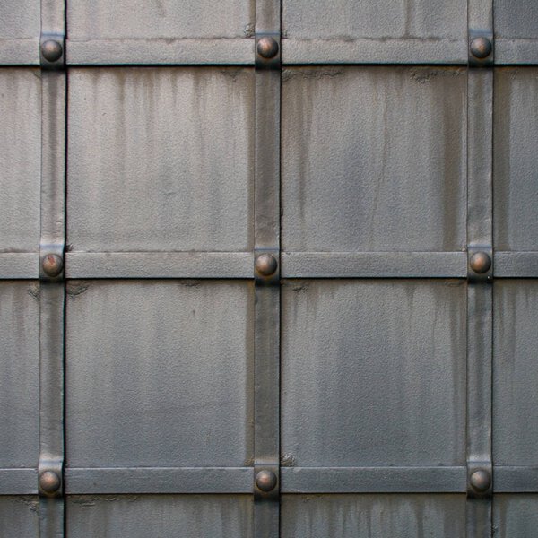 Grunge gray metal texture background with rivets