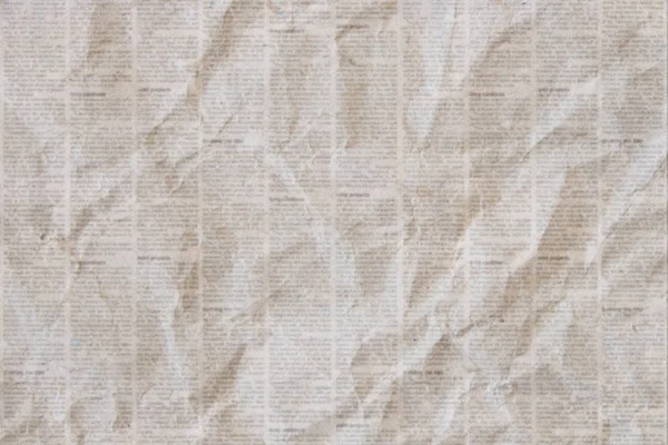 Velho crumpled jornal textura fundo — Fotografia de Stock