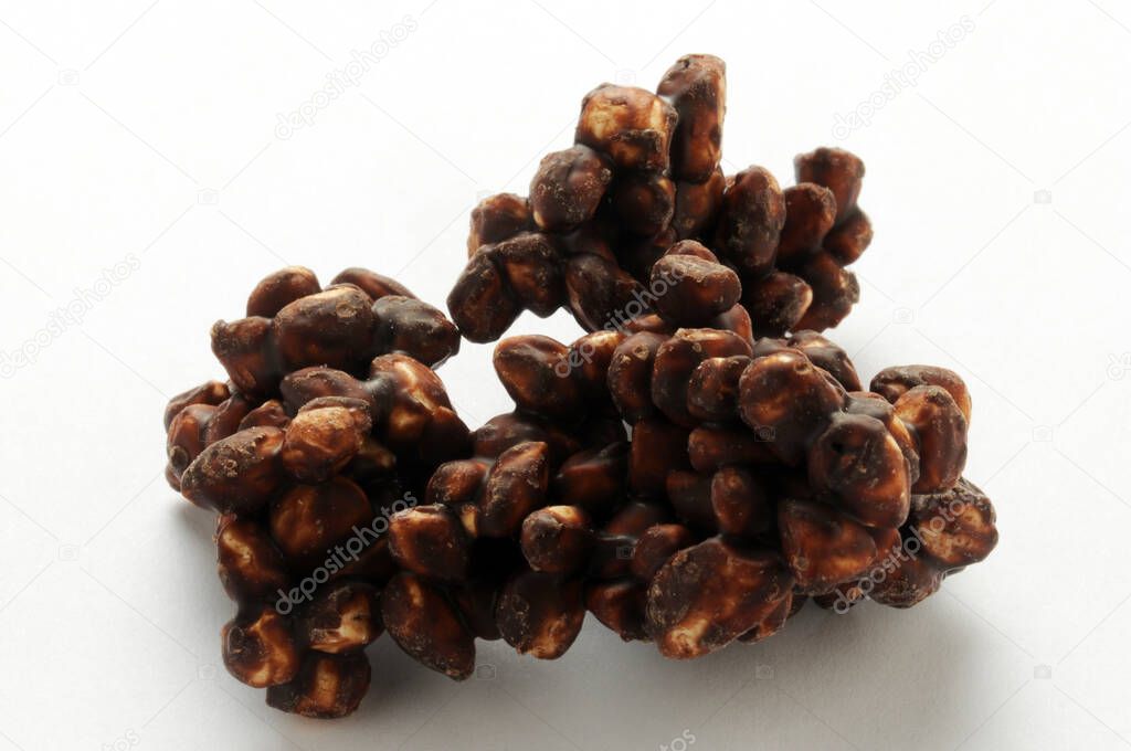 Chocolate puffed rice on white background
