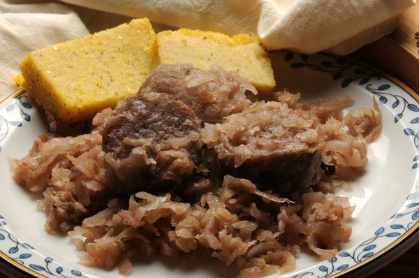 Brovada e musetto with polenta  typical recipe from Friuli Italy