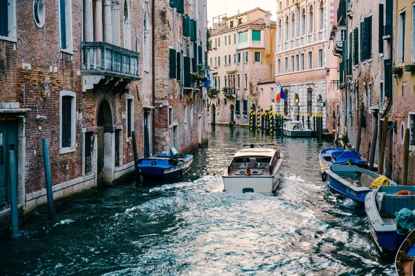 Private boat on a canal in Venice. — Stock Photo, Image