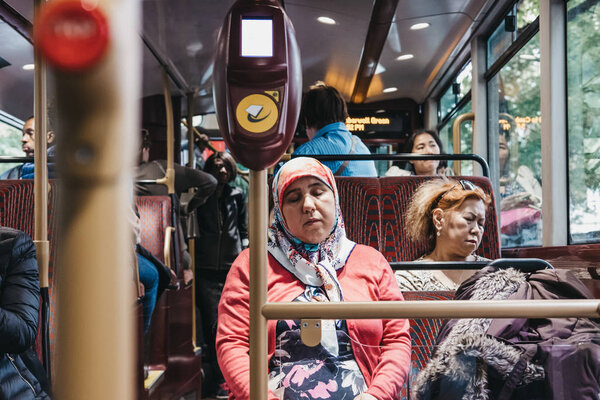 Passengers inside a New Routemaster, London, UK.