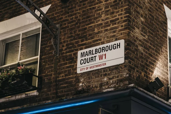 Street name sign on a wall in Marlborough Court, City of Westmin — Stock Photo, Image