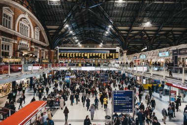 London, UK - November 29, 2019: Large number of people during rush hour inside  Liverpool Street station, a central London railway terminus and connected London Underground station.
