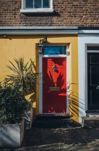 Colourful Bright Red Front Door Yellow House London — Stock Photo, Image