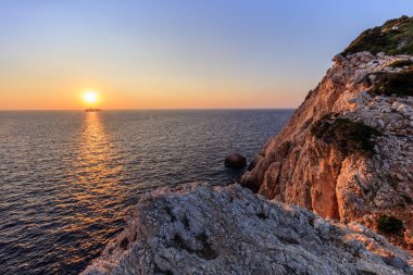 Cape Doukato gün batımı. Lefkada Adası