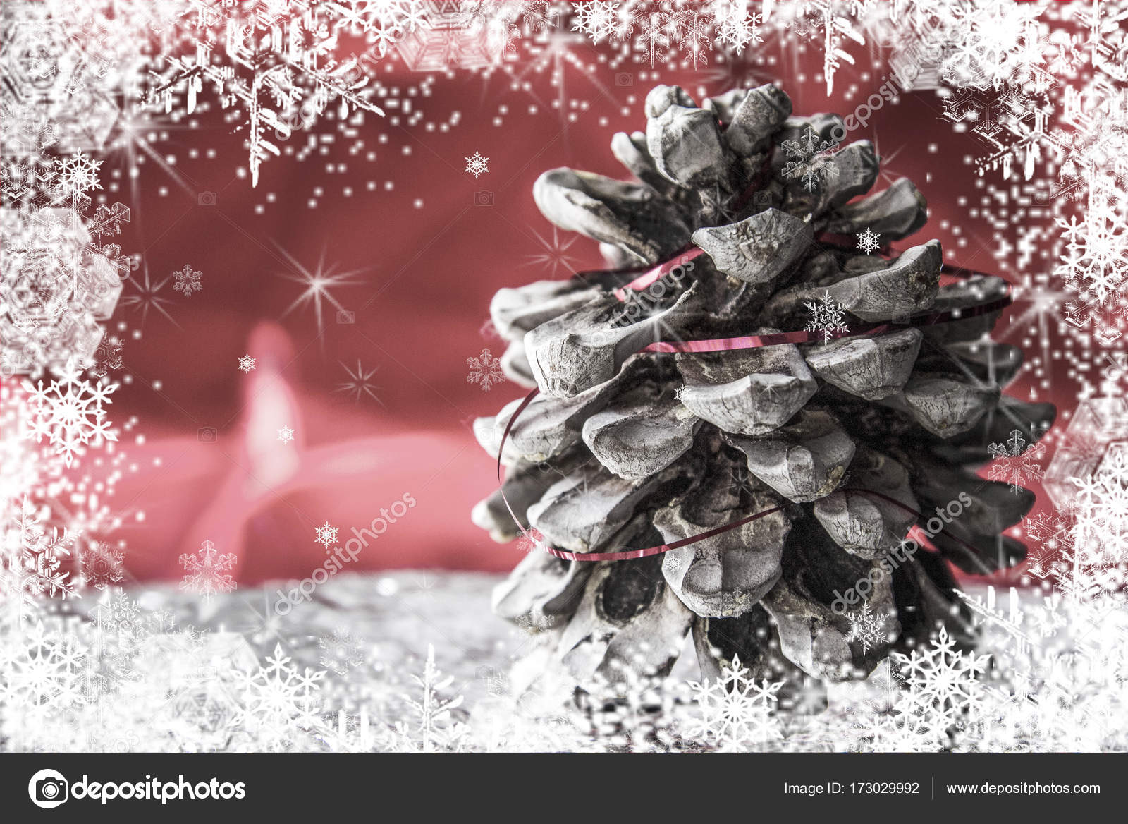 a christmas toy a large pine cone on a red background with snowflakes around it - Decorating Large Pine Cones For Christmas a christmas toy a large pine cone on a red background with snowflakes around it - Decorating Large Pine Cones For Christmas