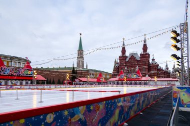 MOSCOW, RUSSIA - FEBRUARY 29, 2020: GUM ice rink on Red Square with colorful lights in early morning in Moscow, Russia