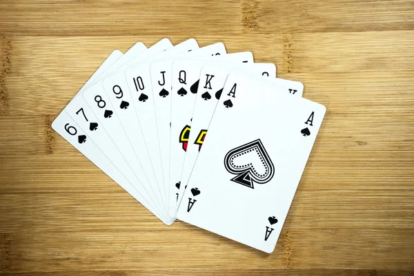 Playing cards on wood