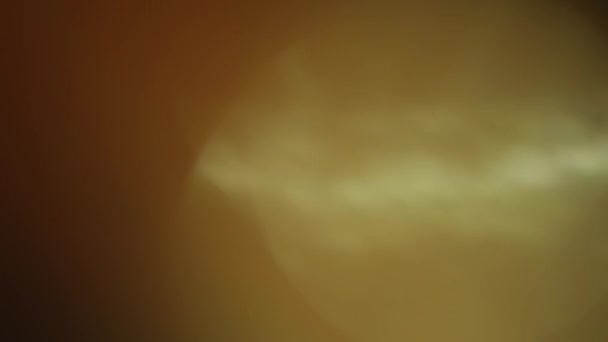 Bokeh chaud dans le noir. Bon pour le mouvement arrière-plan créatif ou transition .