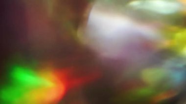 Döngüsel renkli kaplama. Moda ışık geçişleri. Karanlık arka planda parlayan ışık.