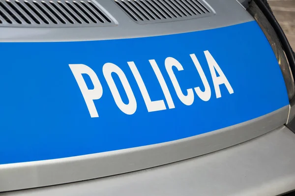 Danzica, Polonia - 27 aprile 2017: iscrizione Policja (Polizia) sulla macchina grigia . — Foto Stock