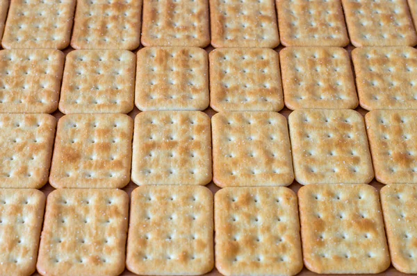 Gezouten Crackers als baskground. — Stockfoto