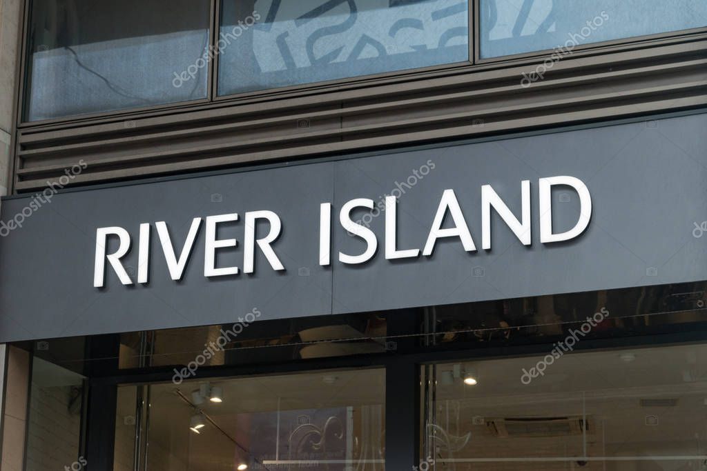 Dublin, Ireland - November 5, 2019: Logo of River Island. River Island is a London-headquartered high street fashion brand.
