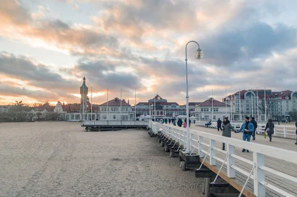 Sunset view with Sopot from wooden pier. — Stock Photo, Image