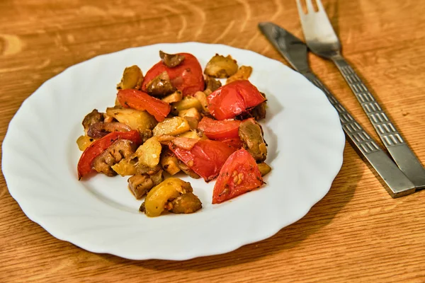 Tasty roasted vegetables on white plate — Stock Photo, Image