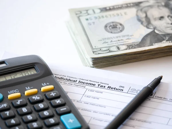 Close Photograph Hard Copy Individual Income Tax Return Black Calculator — Stock Photo, Image