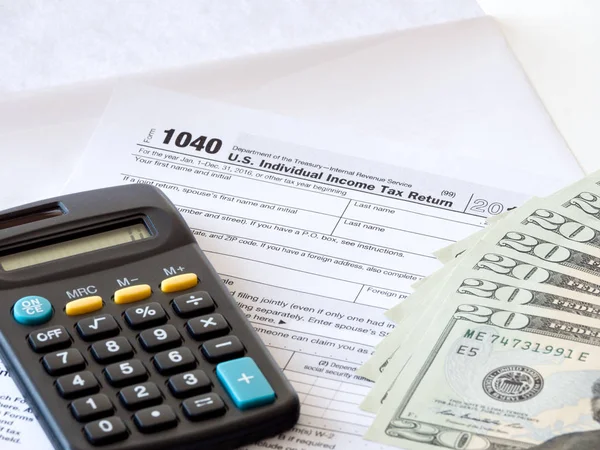 Close Photograph Hard Copy Individual Income Tax Return Black Calculator — Stock Photo, Image