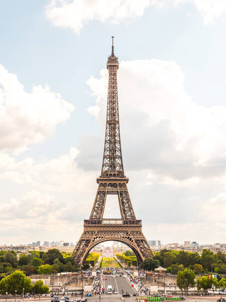 Paris, France - September 2nd, 2017: The Eiffel Tower originally intended to be a temporary structure now welcomes nearly 7 million visitors a year making it the most visited monument in the world.