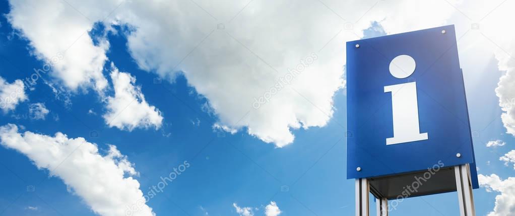 Information sign with clouds background