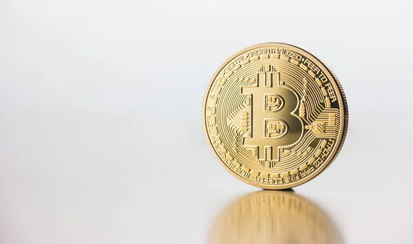 Cryptocurrency physical golden Bitcoin coin — Stock Photo, Image