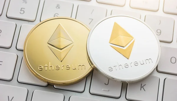 Ethereum coins on keyboard cryptocurrency concept image — Stock Photo, Image