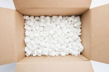Box full of packing peanuts, uncluding copy space clipart