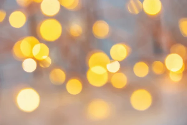 blurred bokeh of Christmas lights. Magic winter holiday abstract