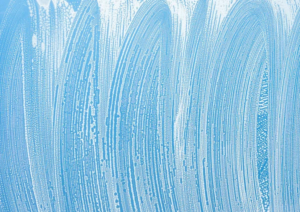 Janela com textura de fundo de espuma de sabão — Fotografia de Stock