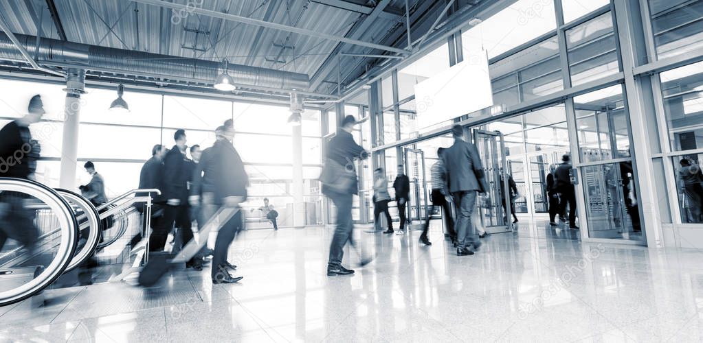 Tradeshow Visitors walking motion blur