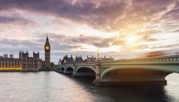 view at sunset of the Big Ben and the Westminster bridge at the thames river in london. ideal for websites and magazines layouts
