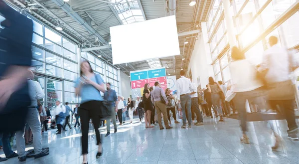 Blurred Trade Fair Visitors Walking Hall — Stock Photo, Image