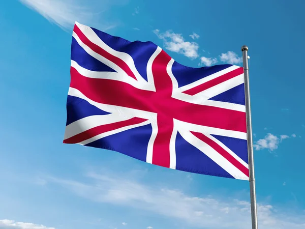 Bandera británica ondeando en el cielo azul — Foto de Stock