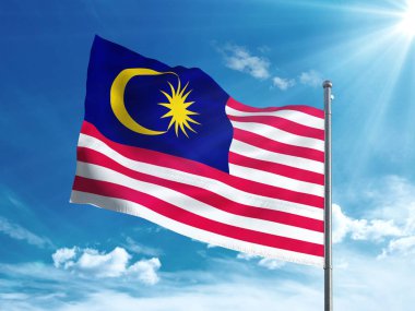 Malezya bayrak mavi gökyüzünde sallayarak