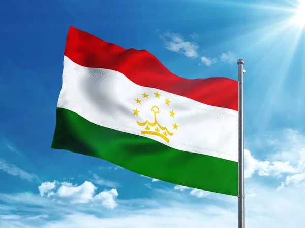 Tadzjiekse vlag zwaaien in de blauwe hemel — Stockfoto