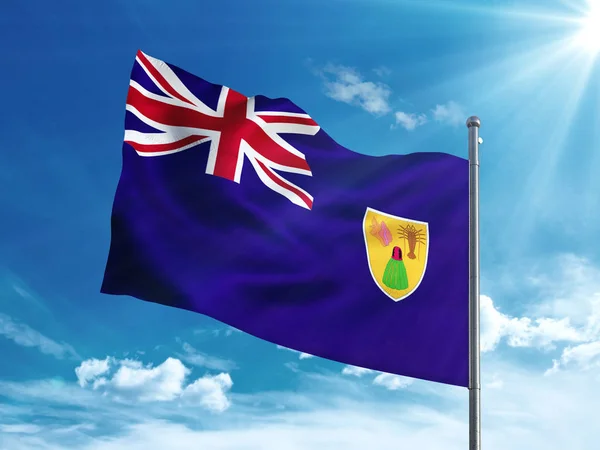 Bandeira de Turks e Caicos Islander acenando no céu azul — Fotografia de Stock