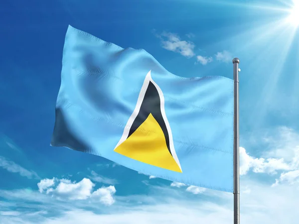 Saint Lucian flag waving in the blue sky — Stock Photo, Image