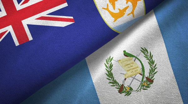 Anguila y Guatemala dos banderas de tela textil, textura de tela —  Fotos de Stock