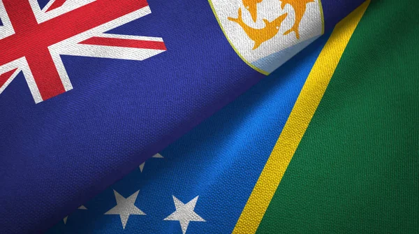 Anguilla and Solomon Islands two flags textile cloth, fabric texture
