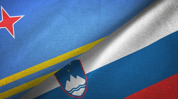 Aruba y Eslovenia dos banderas tela textil, textura de la tela —  Fotos de Stock