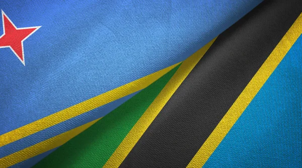Aruba and Tanzania two flags textile cloth, fabric texture — Stock Photo, Image