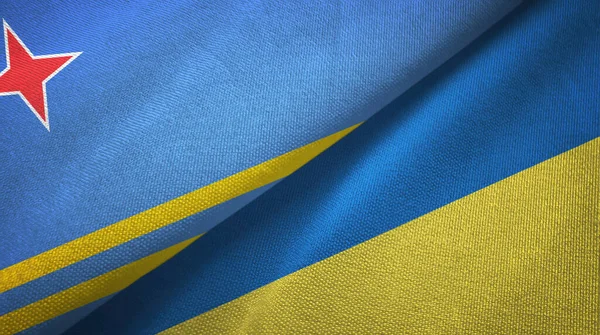 Aruba and Ukraine two flags textile cloth, fabric texture — Stock Photo, Image