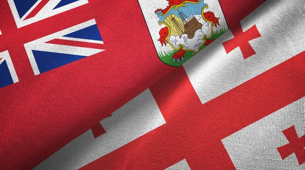 Bermudas y Georgia dos banderas tela textil, textura de la tela — Foto de Stock