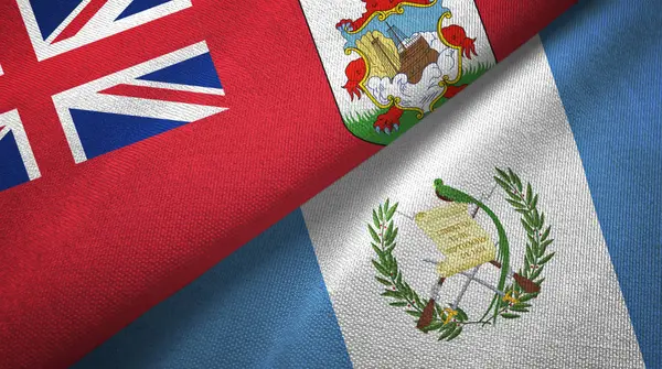 Bermudas y Guatemala dos banderas de tela textil, textura de tela —  Fotos de Stock
