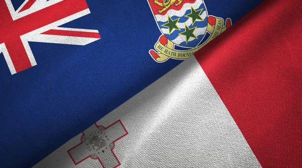 Каймановы острова и Мальта два флага текстильная ткань, текстура ткани — стоковое фото