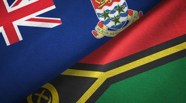 Kajmán-szigetek és Vanuatu két zászlós textilszövet, szövet textúra — Stock Fotó