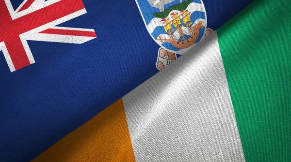 Фолклендские острова и Кот-д "Ивуар Берег слоновой кости два флага текстура ткани — стоковое фото