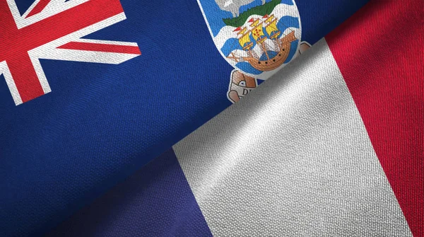 Фолклендские острова и Франция два флага текстильная ткань, текстура ткани — стоковое фото