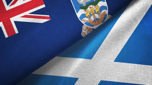 Фолклендские острова и Шотландия два флага текстильная ткань, текстура ткани — стоковое фото